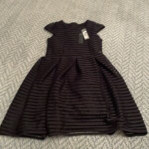 IKKS girls size 12 black party dress. Cap sleeve. Zipper in back